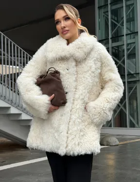 Белая шубка из тиградо - фото 10